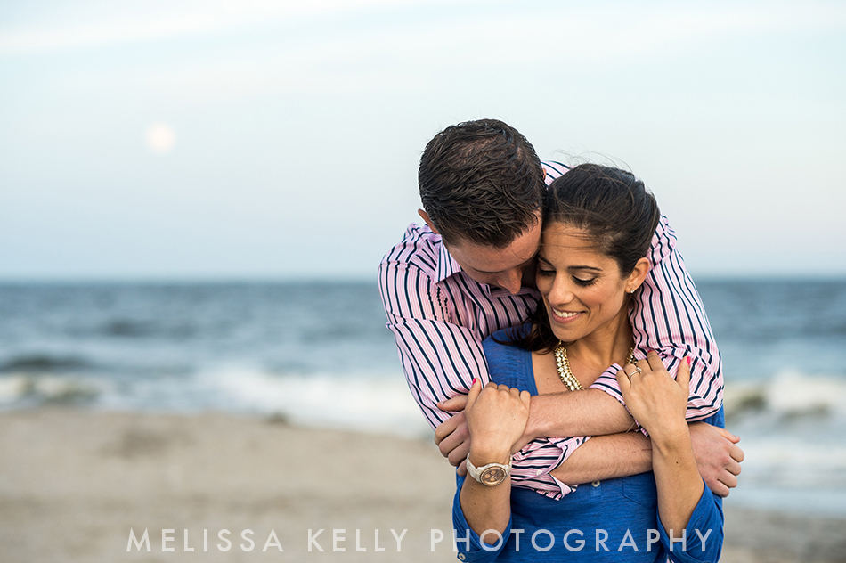 Ocean City engagement photo on beach with moon.